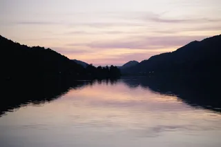 The Alpsee in the Allgäu at sunset. You can read all about Camping Große Alpsee here.