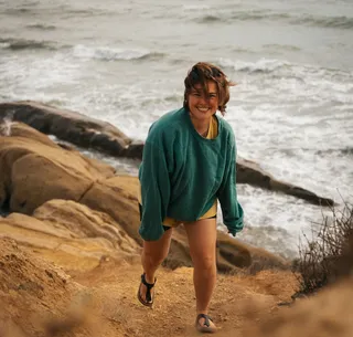 Woman on Blessed Coast - Sea in the background